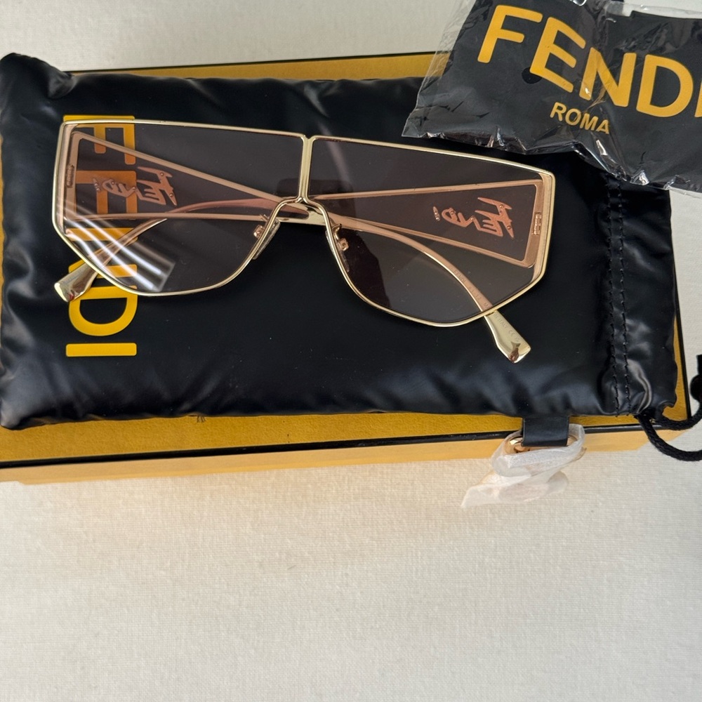 Fendi Women's Sunglasses with Gold Frame and Brown Lenses
